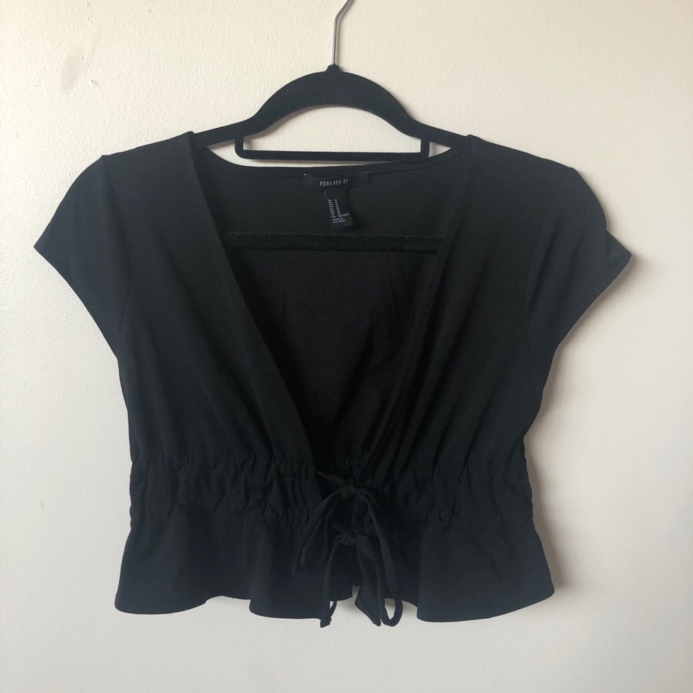 Black cropped peplum style top